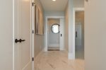 Entry way to the master bath with large closet 